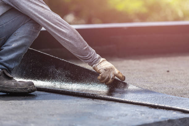 Professional Basement Waterproofing technician working in Murdock, KS